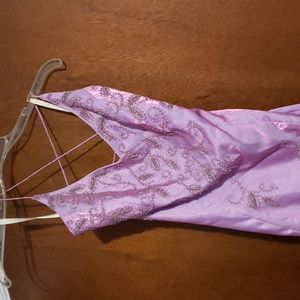 Purple Prom dress with beaded detail.    Lace up back Size 10